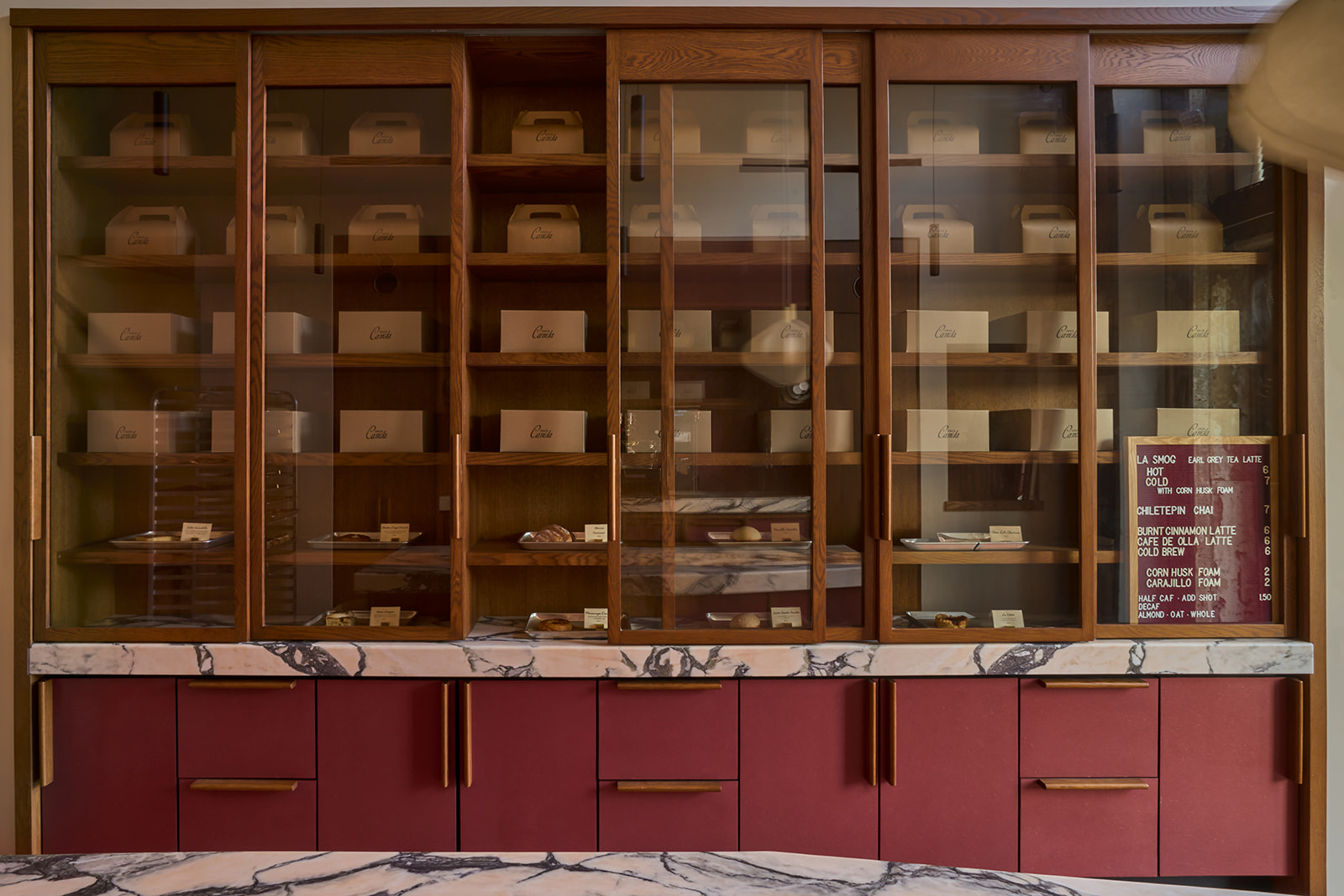 Pastry cabinets and the drink menu