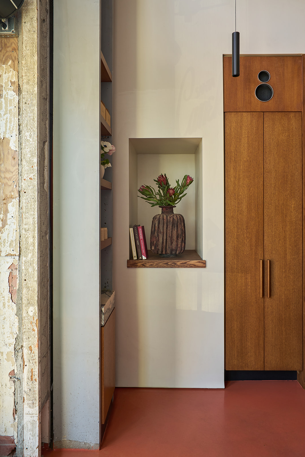 A ceramic vase in a wall niche